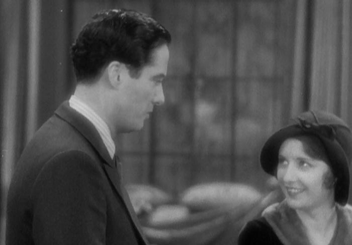 The movie summed up: Odd framing, lovely smile. 