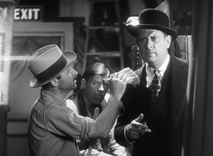 This is a great subtle bit, where a worker comes up and starts casually brushing off Hornsby. The man is such a dirty cheat, people feel compelled to clean him off without prompting! 