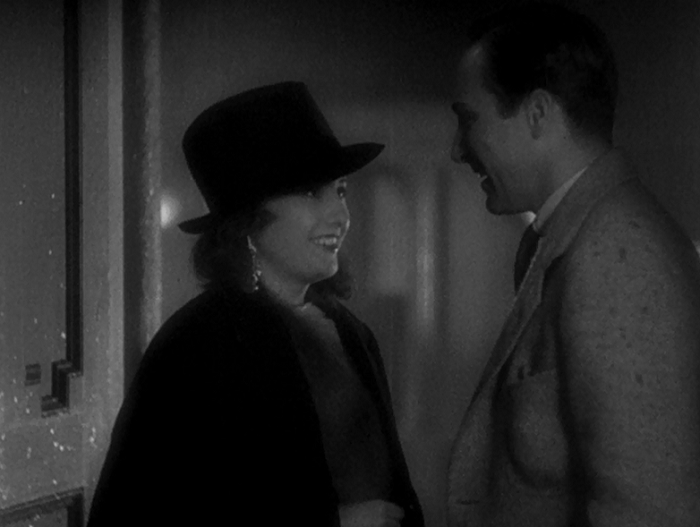 She looks great in that hat, too, even though he'll never appreciate it. 