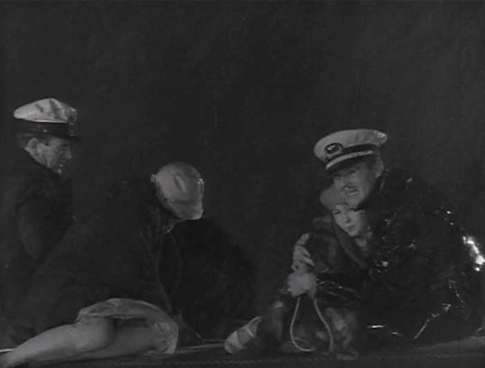 In other 'famous actors appear in the margins', check out Brown's co-pilot on the left. Yep, that's John Wayne. 