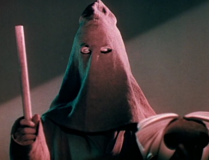 One quick question: who is the character under this mask? Because every other nefarious character is pretty much accounted for during this scene.