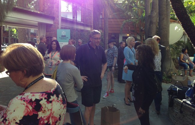 A crowd gathers for the 'Going to the TCM Film Festival!' event. 